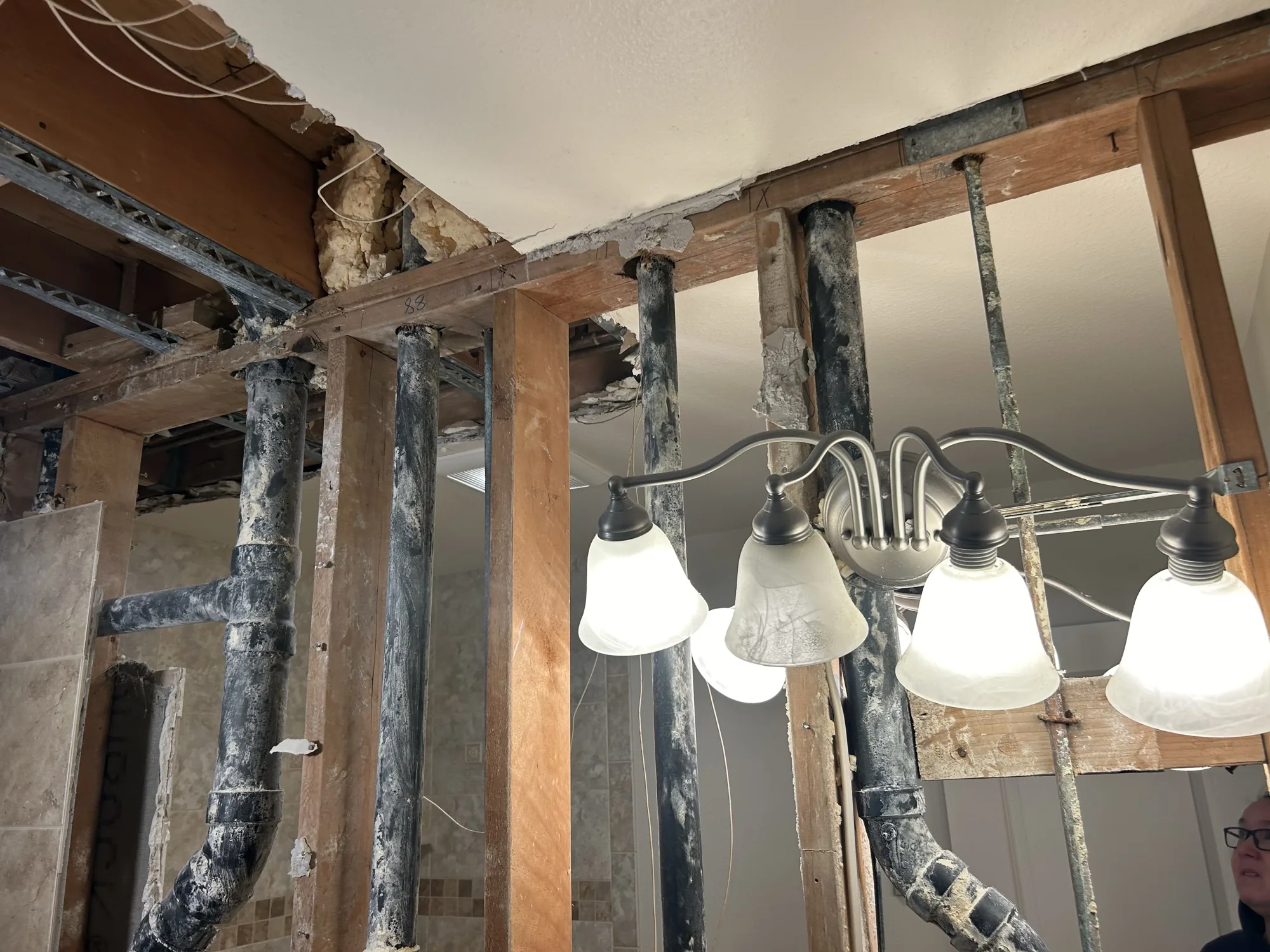 Ceiling framing in progress during interior remodel